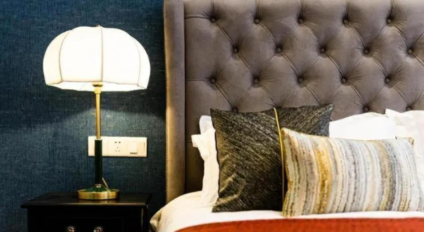 Bed in Origin Antique House and Hotel