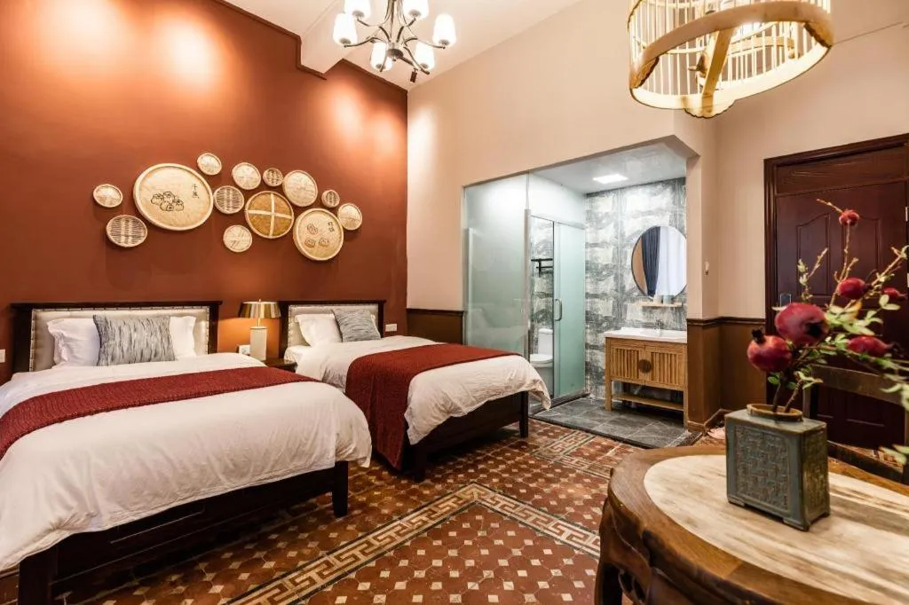 Bed in Origin Antique House and Hotel