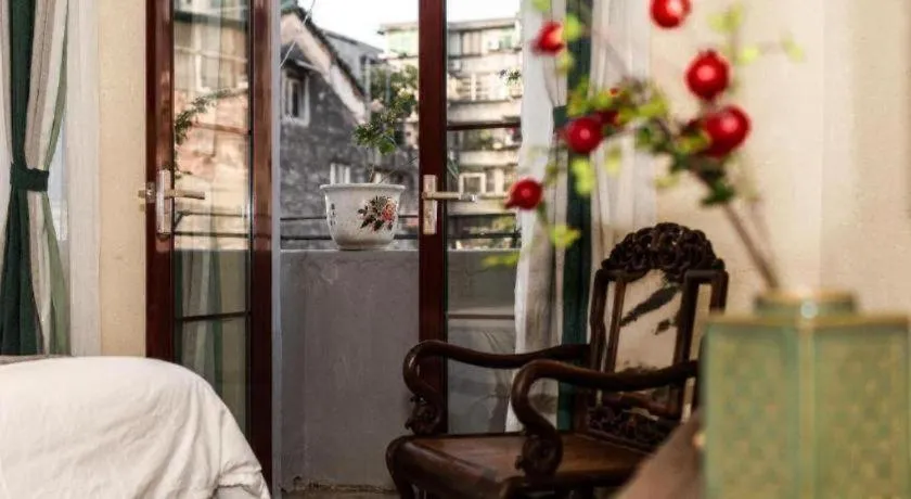 Bed in Origin Antique House and Hotel