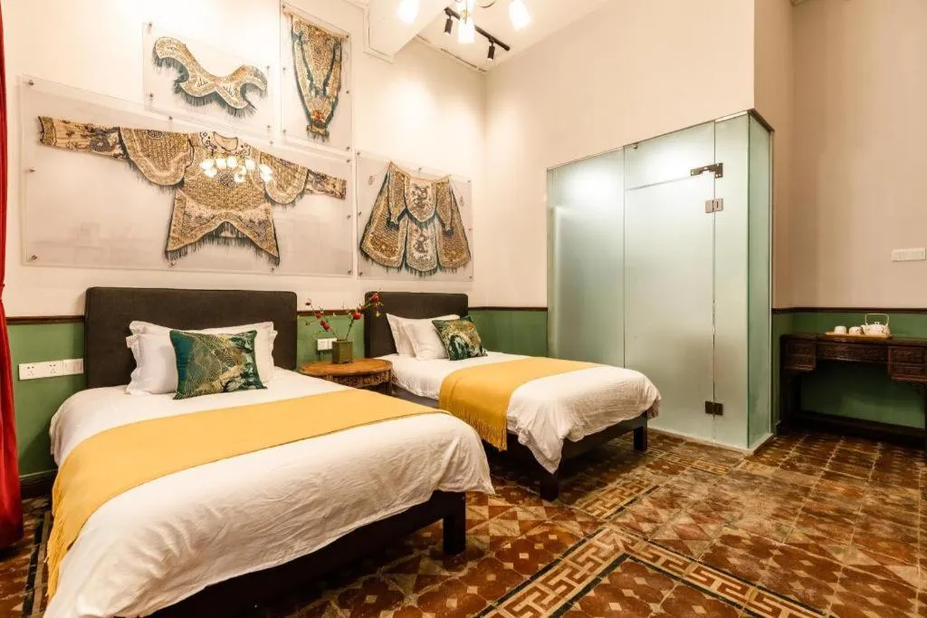 Bed in Origin Antique House and Hotel