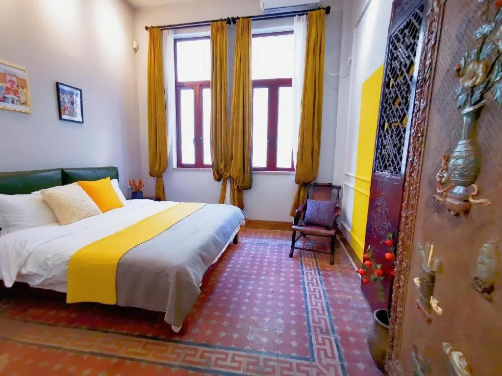 Bed in Origin Antique House and Hotel
