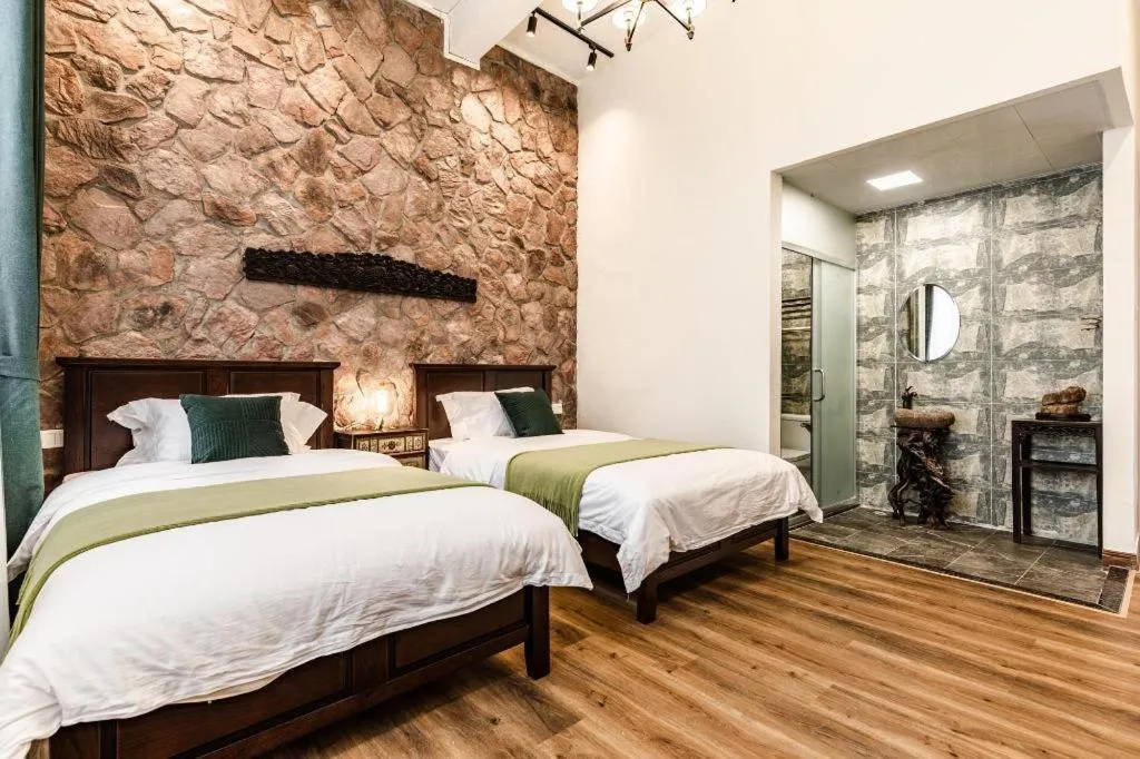 Bed in Origin Antique House and Hotel