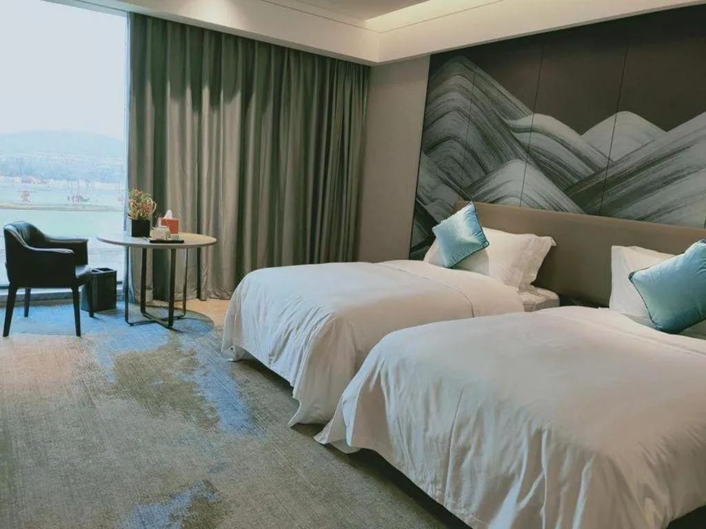 Bed in Yinhu Junyi Hotel（Wildlife Park）