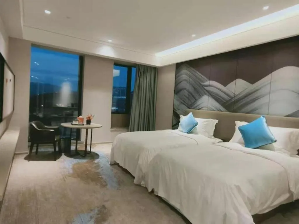 Bed in Yinhu Junyi Hotel（Wildlife Park）