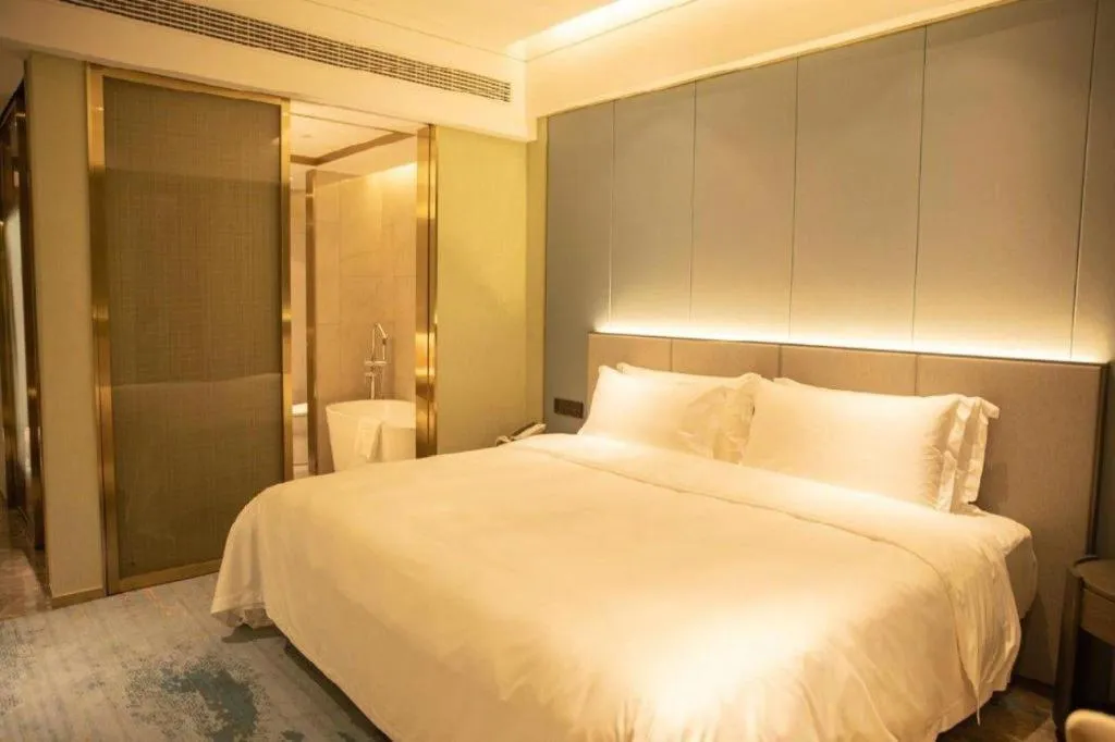 Bed in Yinhu Junyi Hotel（Wildlife Park）