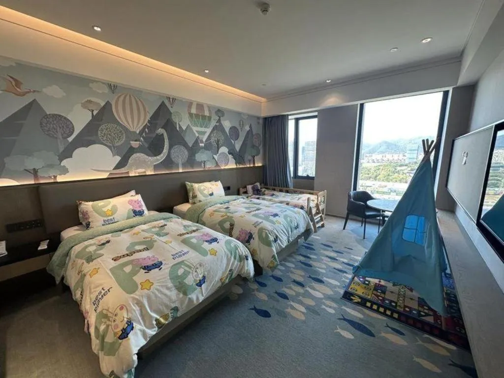 Bed in Yinhu Junyi Hotel（Wildlife Park）