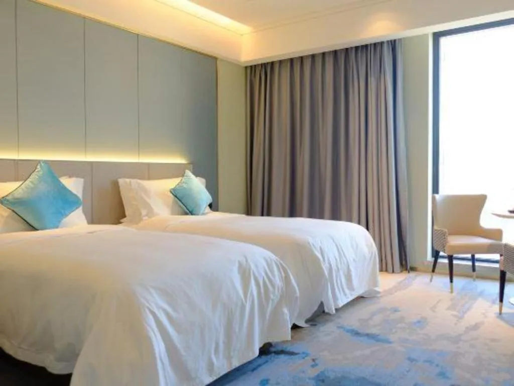 Bed in Yinhu Junyi Hotel（Wildlife Park）