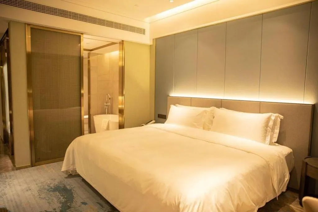 Bed in Yinhu Junyi Hotel（Wildlife Park）