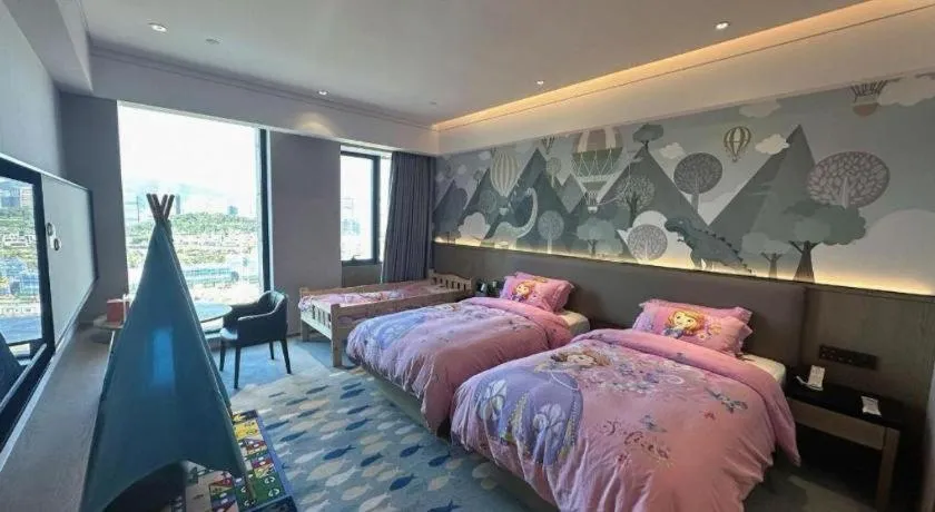 Bed in Yinhu Junyi Hotel（Wildlife Park）