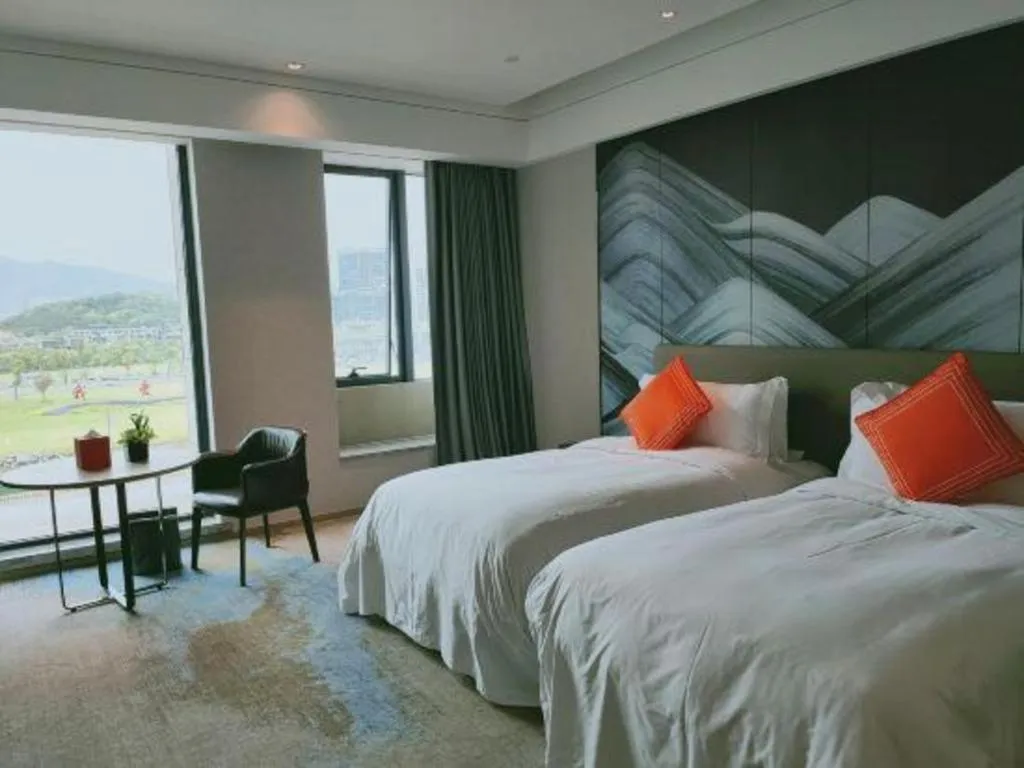 Bed in Yinhu Junyi Hotel（Wildlife Park）