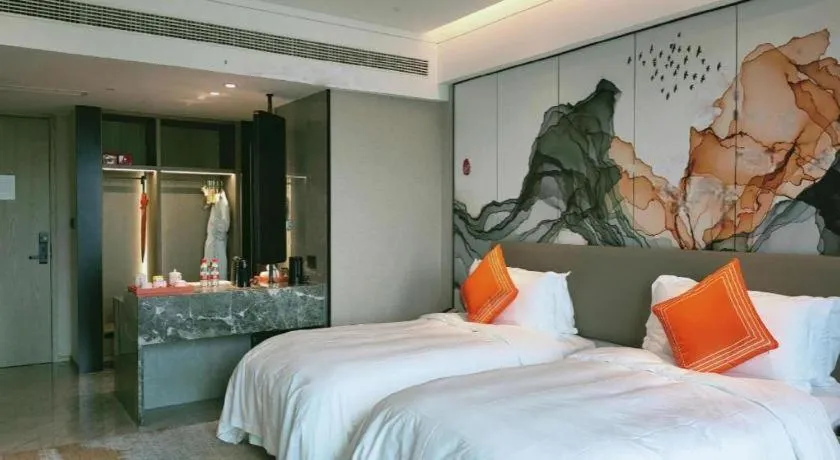 Bed in Yinhu Junyi Hotel（Wildlife Park）