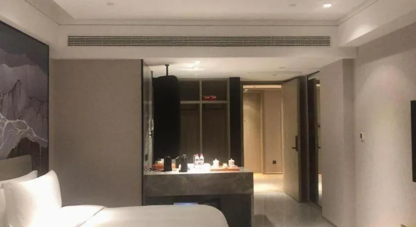 Bed in Yinhu Junyi Hotel（Wildlife Park）