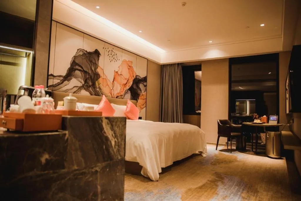 Bed in Yinhu Junyi Hotel（Wildlife Park）