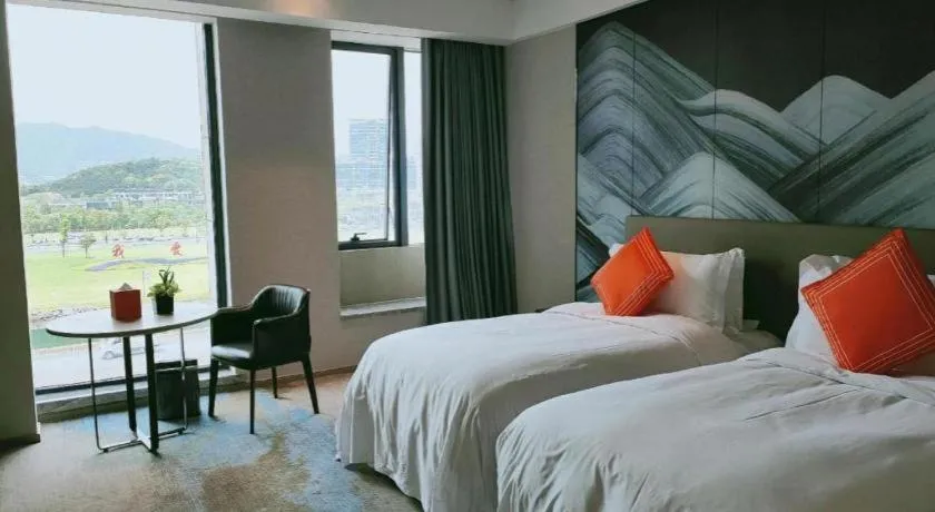 Bed in Yinhu Junyi Hotel（Wildlife Park）