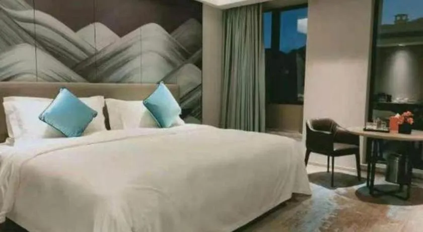 Bed in Yinhu Junyi Hotel（Wildlife Park）