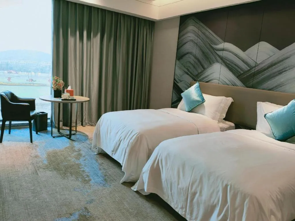 Bed in Yinhu Junyi Hotel（Wildlife Park）