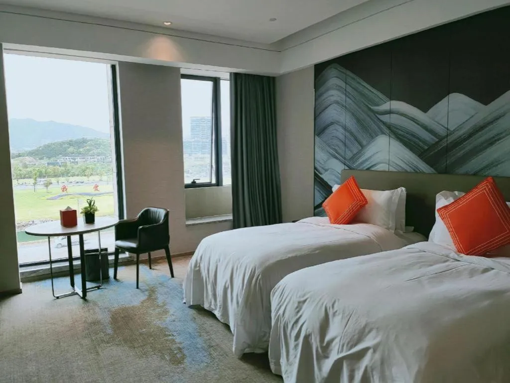 Bed in Yinhu Junyi Hotel（Wildlife Park）