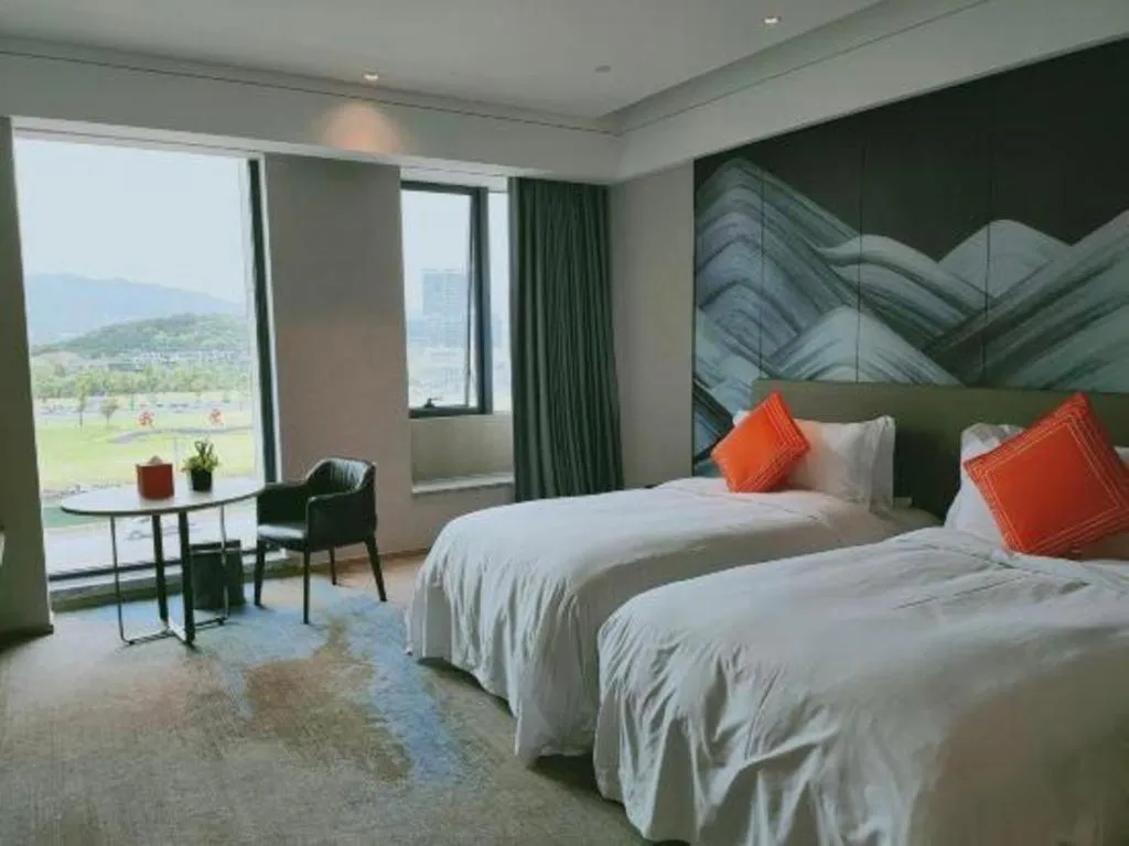 Bed in Yinhu Junyi Hotel（Wildlife Park）