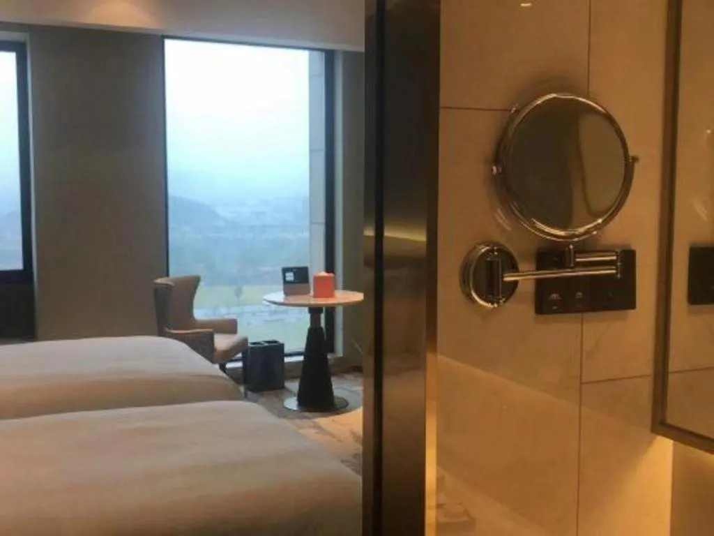 Bed in Yinhu Junyi Hotel（Wildlife Park）