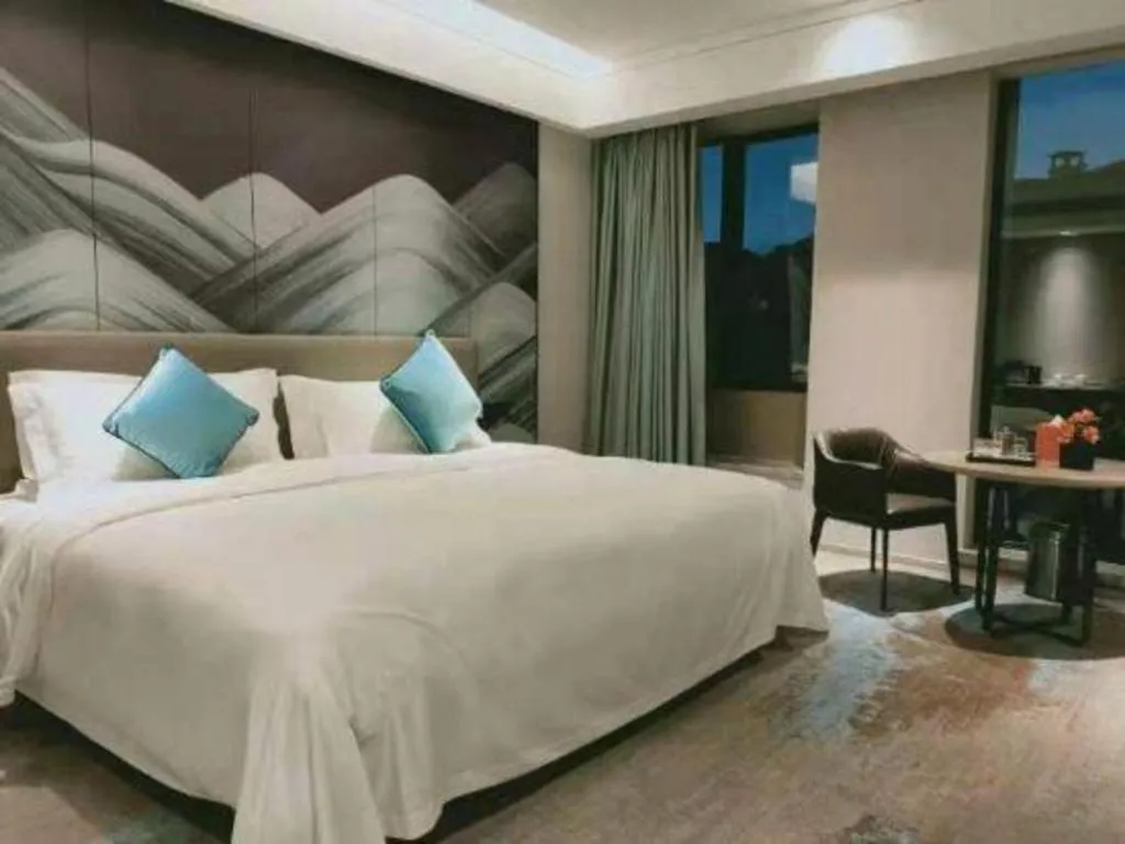 Bed in Yinhu Junyi Hotel（Wildlife Park）