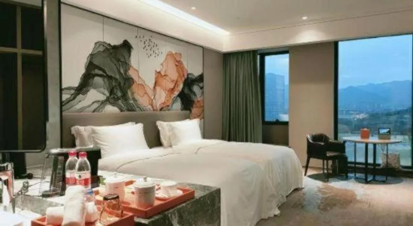 Bed in Yinhu Junyi Hotel（Wildlife Park）