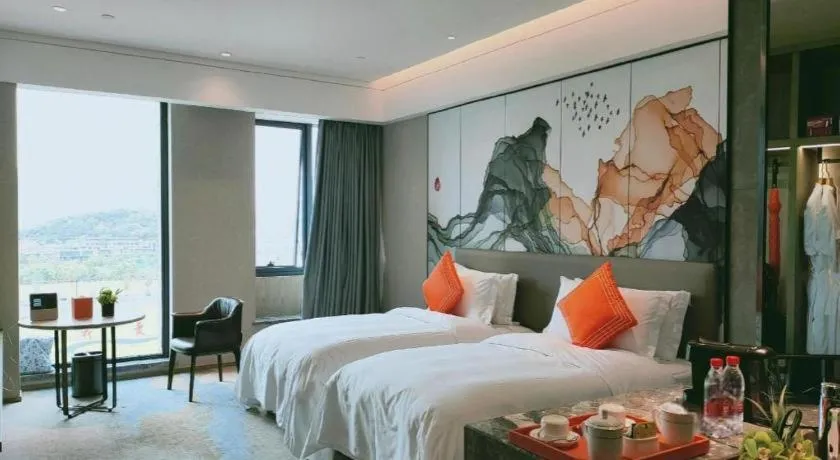 Bed in Yinhu Junyi Hotel（Wildlife Park）