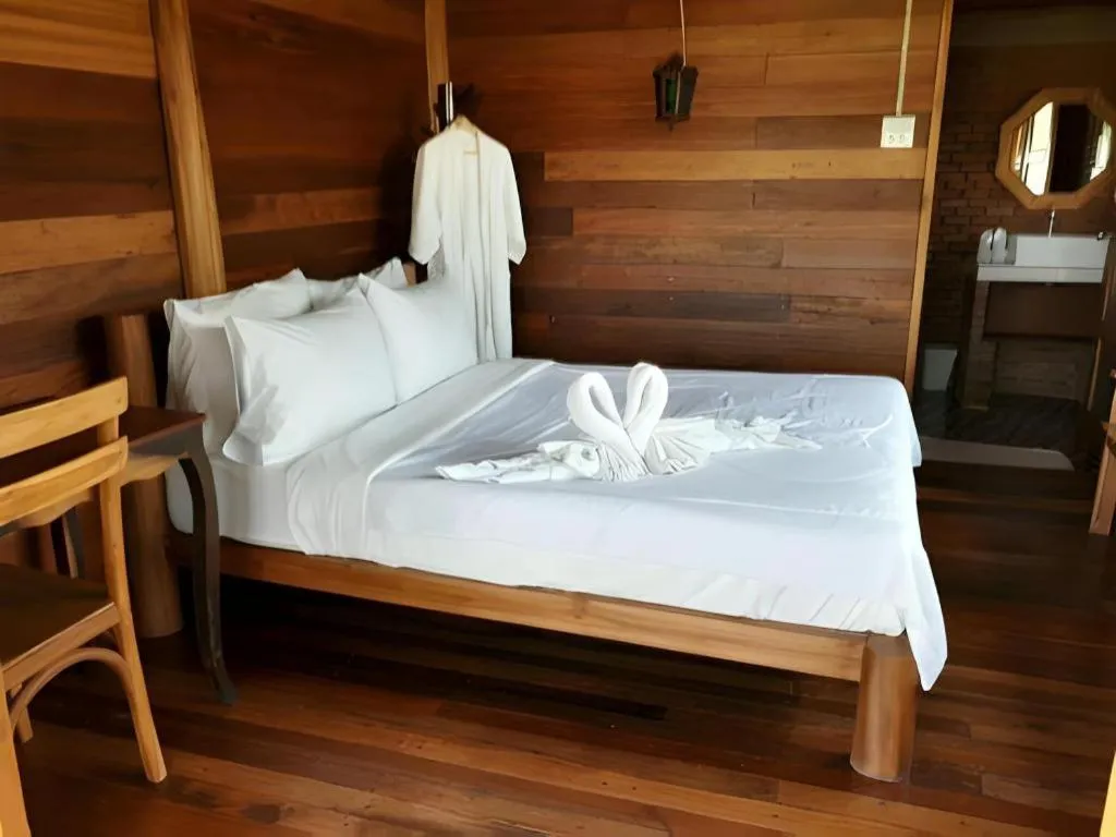 Bed in Gin's Greenery Resort