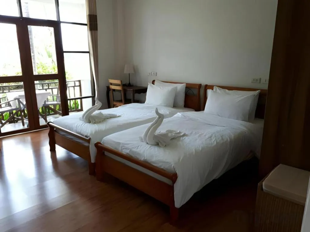 Bed in Gin's Greenery Resort