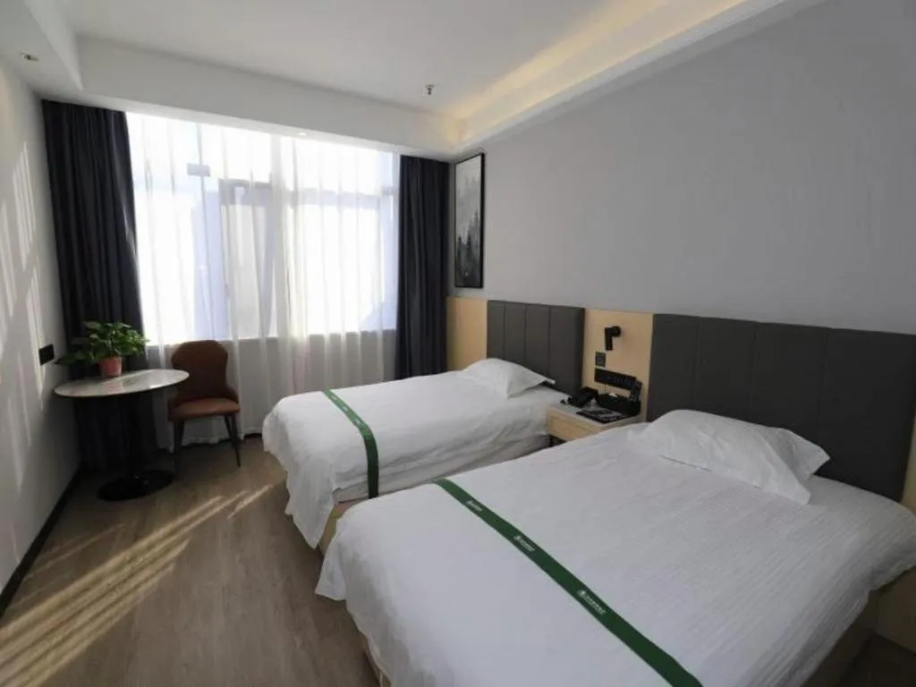 Bed in GreenTree Inn Express Fuyang University Town West High-Speed Railway Station