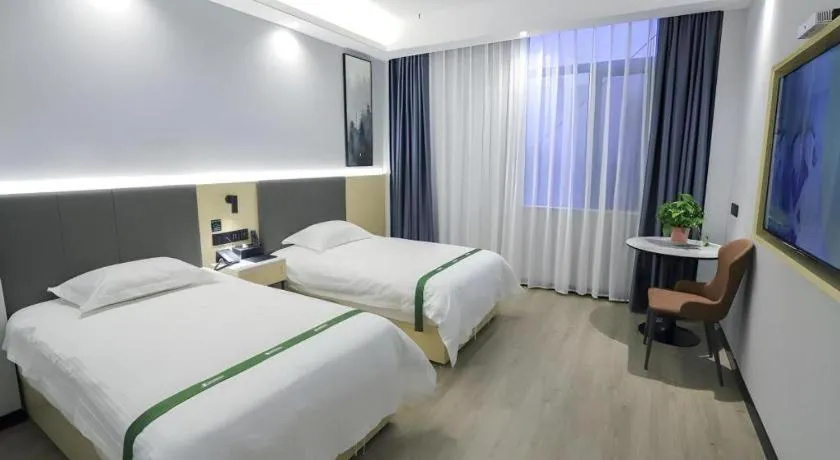 Bed in GreenTree Inn Express Fuyang University Town West High-Speed Railway Station