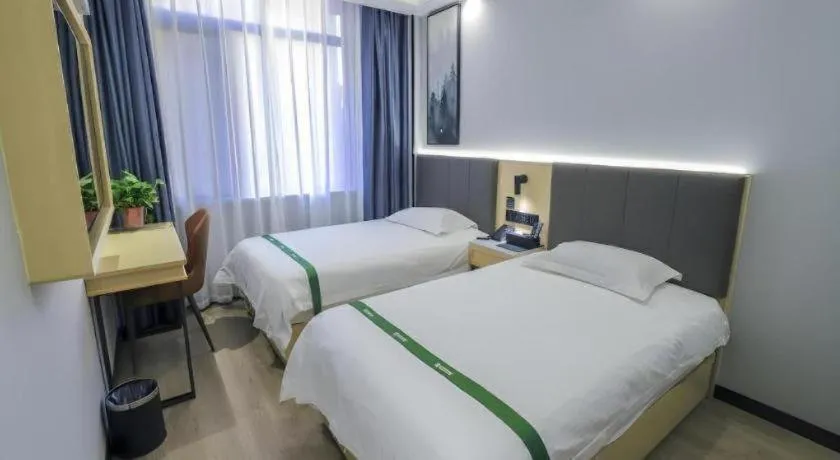 Bed in GreenTree Inn Express Fuyang University Town West High-Speed Railway Station