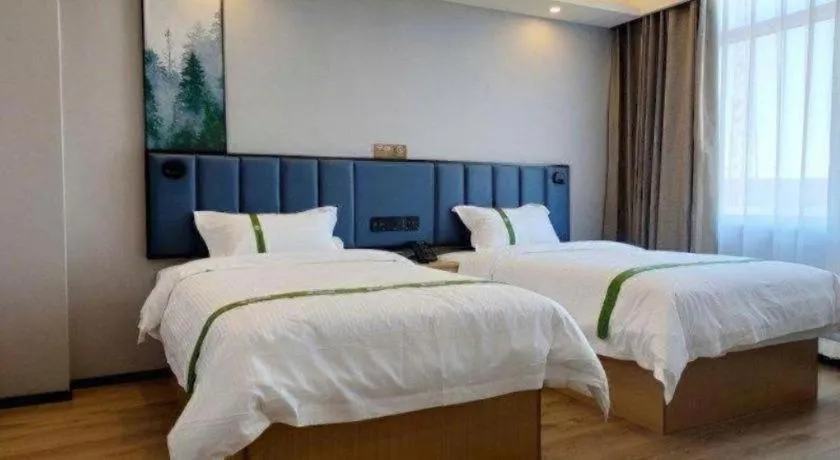 Bed in GreenTree Inn Express Qingdao Jiaodong International Airport