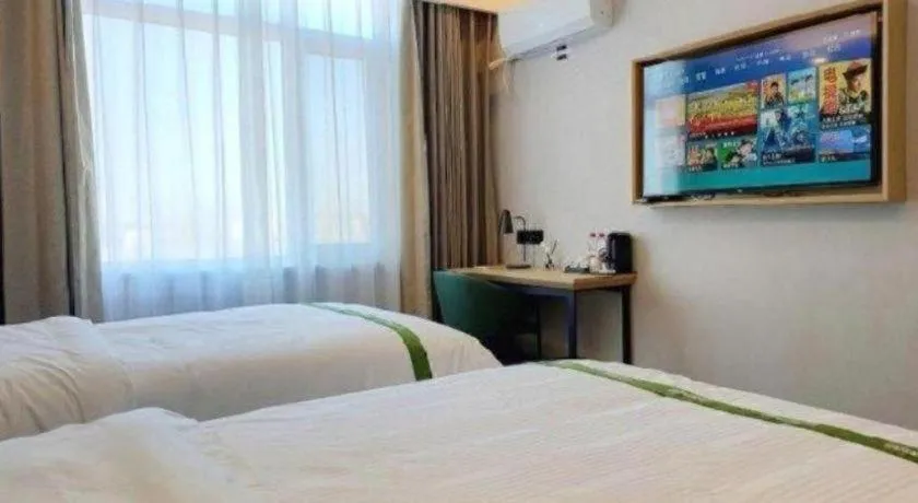 Bed in GreenTree Inn Express Qingdao Jiaodong International Airport