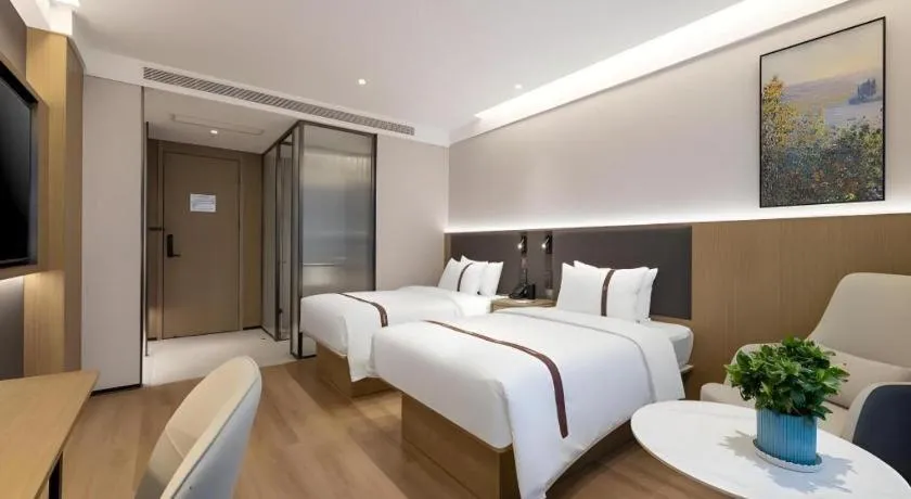 Bed in GYA Hotel Taiyuan Jinyang Street Grand Shanxi Hospital