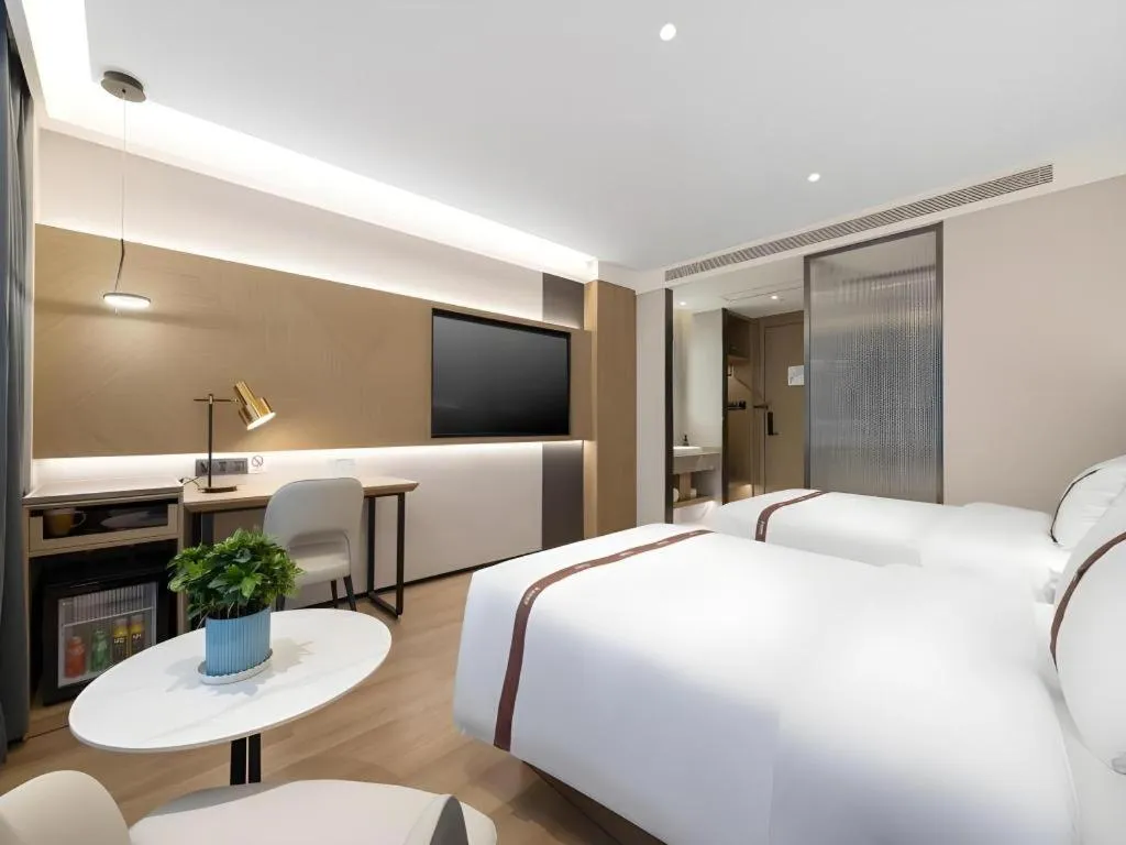 Bed in GYA Hotel Taiyuan Jinyang Street Grand Shanxi Hospital