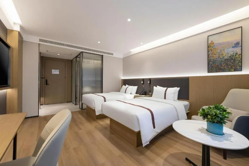 Bed in GYA Hotel Taiyuan Jinyang Street Grand Shanxi Hospital