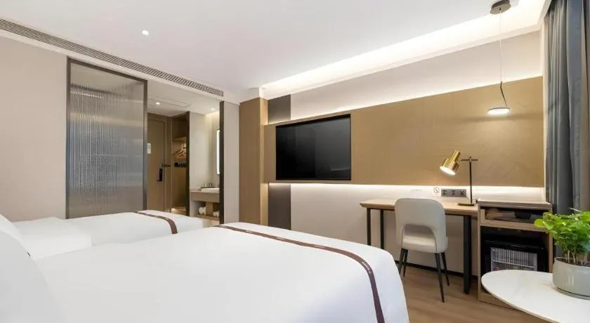 Bed in GYA Hotel Taiyuan Jinyang Street Grand Shanxi Hospital