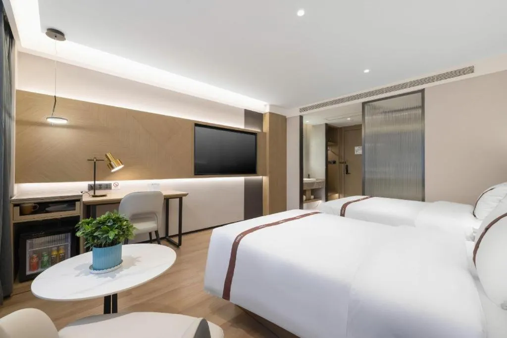 Bed in GYA Hotel Taiyuan Jinyang Street Grand Shanxi Hospital