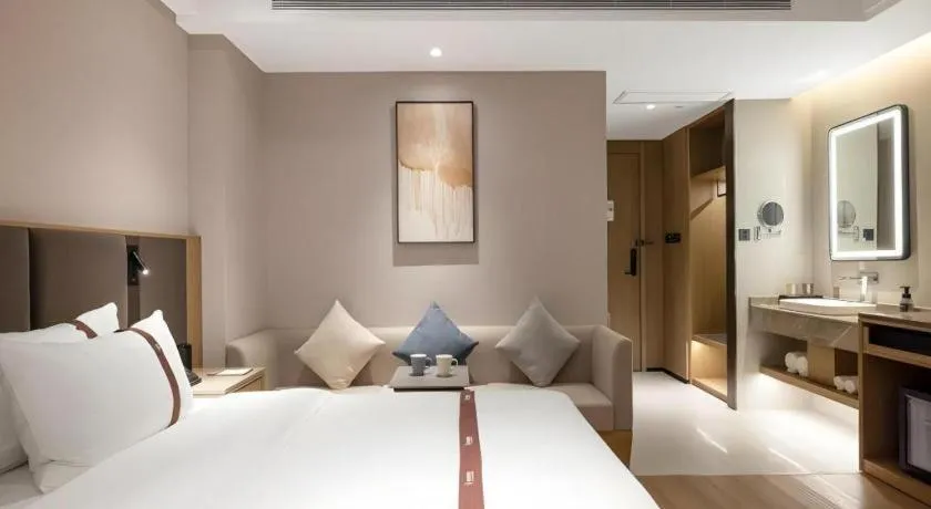 Bed in GYA Hotel Taiyuan Jinyang Street Grand Shanxi Hospital