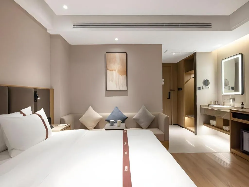Bed in GYA Hotel Taiyuan Jinyang Street Grand Shanxi Hospital