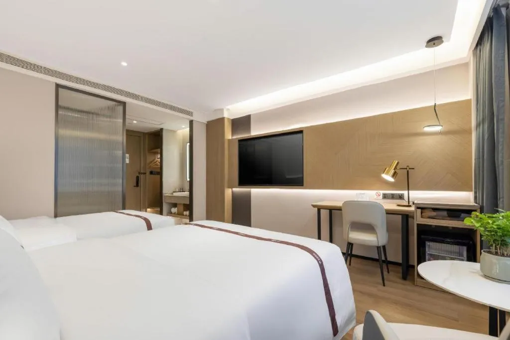 Bed in GYA Hotel Taiyuan Jinyang Street Grand Shanxi Hospital