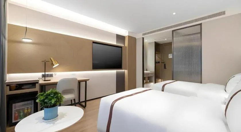 Bed in GYA Hotel Taiyuan Jinyang Street Grand Shanxi Hospital