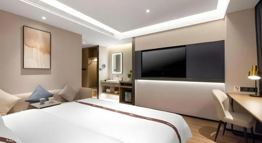 Bed in GYA Hotel Taiyuan Jinyang Street Grand Shanxi Hospital