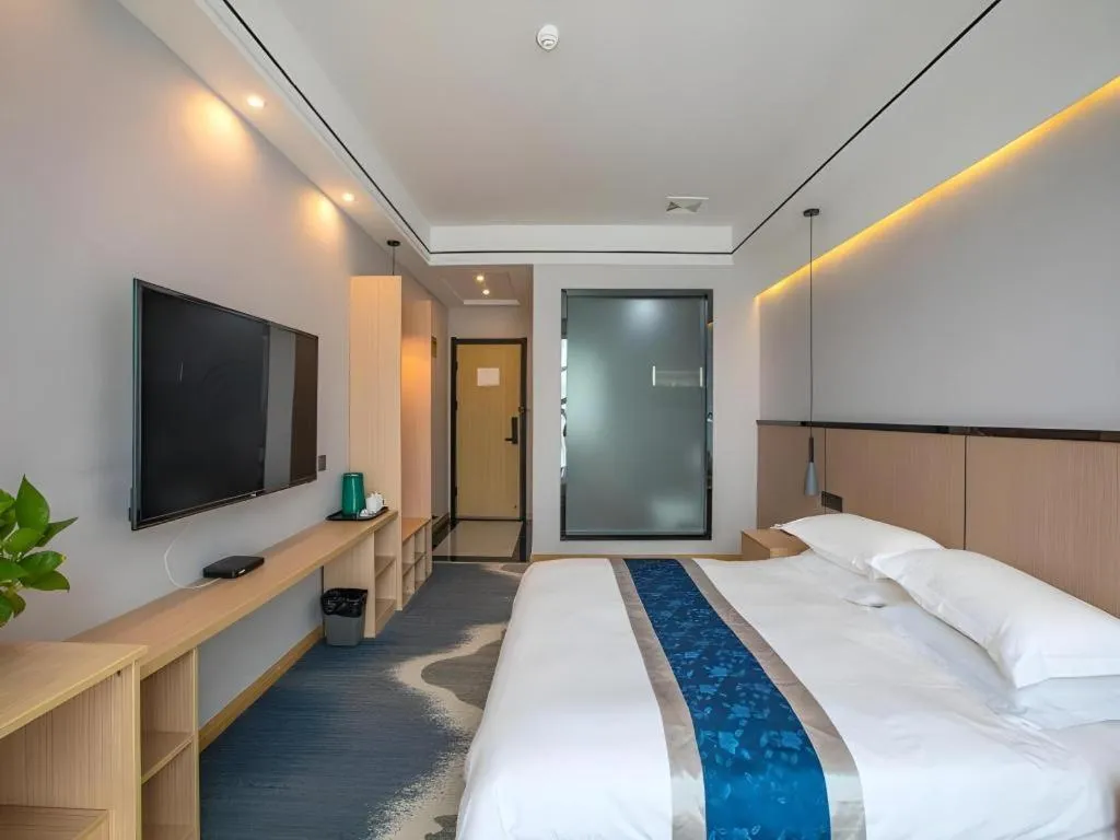 Bed in GELI Hotel Huainan Railway Station Sports Center