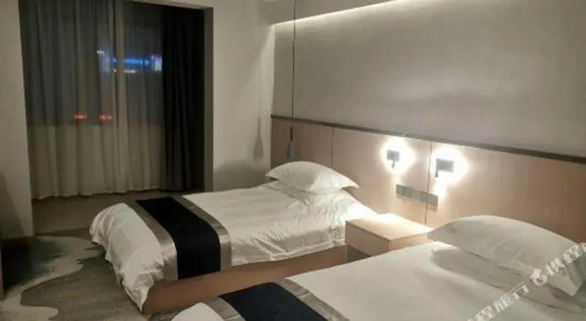 Bed in GELI Hotel Huainan Railway Station Sports Center