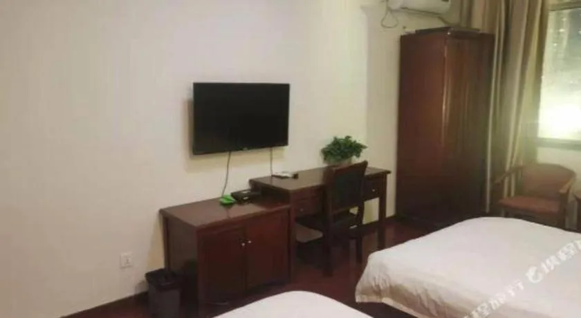 Bed in GELI Hotel Huainan Railway Station Sports Center
