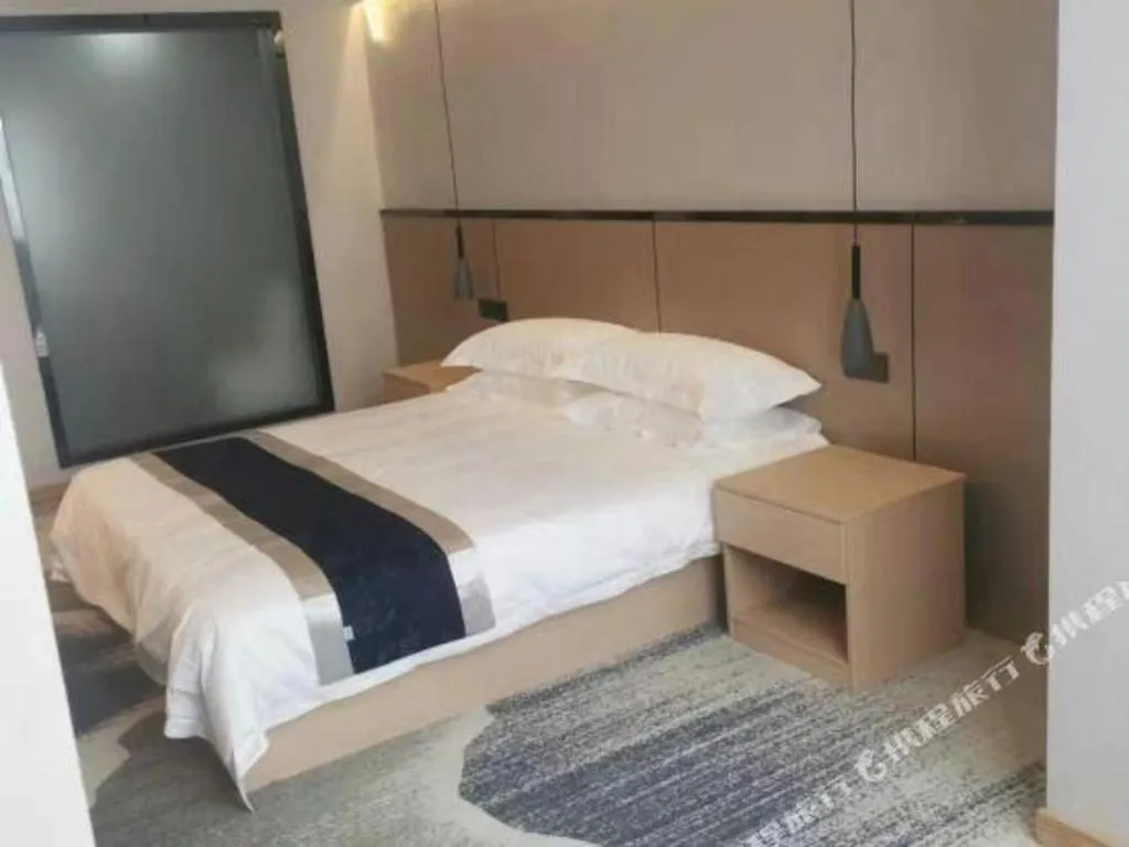 Bed in GELI Hotel Huainan Railway Station Sports Center