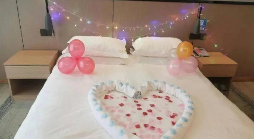 Bed in GELI Hotel Huainan Railway Station Sports Center