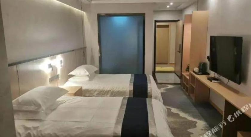 Bed in GELI Hotel Huainan Railway Station Sports Center