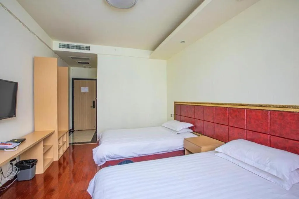 Bed in GELI Hotel Huainan Railway Station Sports Center